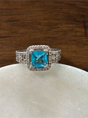 Silver Ring with Bright Blue Square Gemstone and Halo Accent